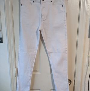 Encrypted white skinny jeans